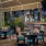 outdoor seating, grill stations and  a TV