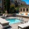 whirlpool spa area with bubbling water and seating